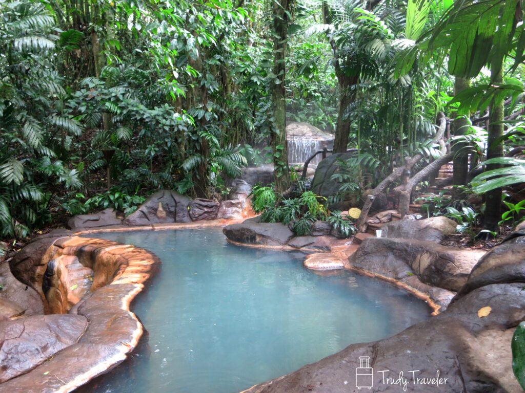 blue green pool of hot springs