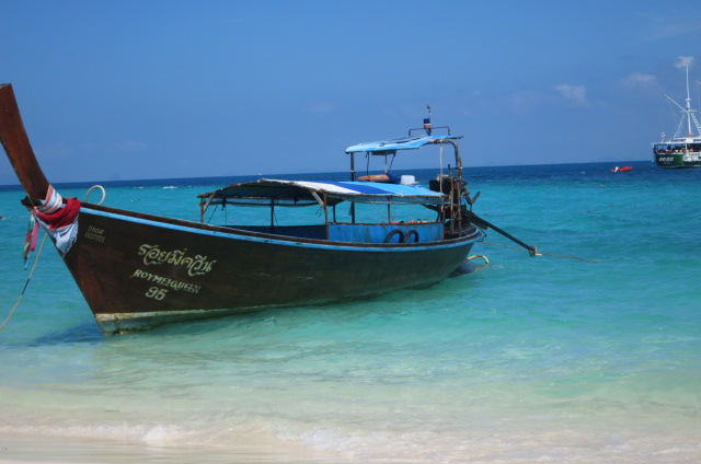 Long boat tied up to the shore in Ao Nang, Thailand