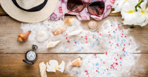 10 Must-Have Travel Products You'll Wish You'd Found Sooner: sunglasses, hat, sand shells