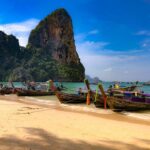 Thailand beach with longboats