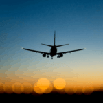 Airport landing at sunset