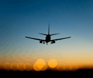 Airport landing at sunset