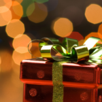 red gift with green bow