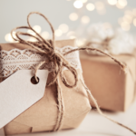 gits wrapped in brown paper with twine bow