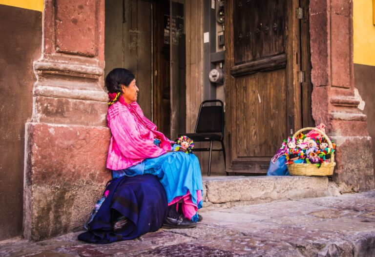 20 Amazing Things to Do in Cabo San Lucas; Lady selling dolls on street Mexico