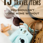 sunglasses, camera, toy plane on a desk