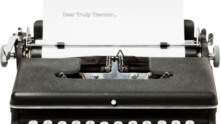 typewriter with a letter starting Dear Trudy Traveler