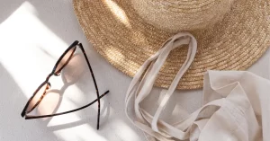 summer must haves and summer essentials, summer hat, sunglasses and bag