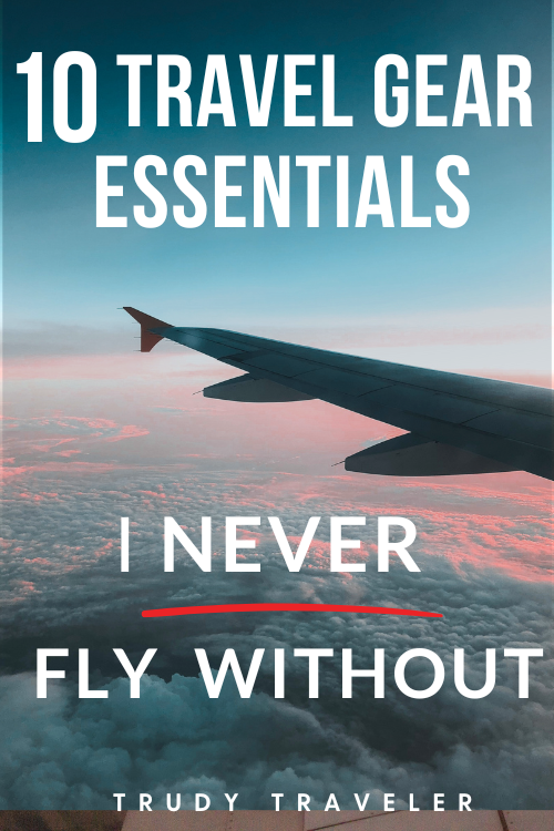 Plane in clouds - TRAVEL GEAR 10 ESSENTIALS