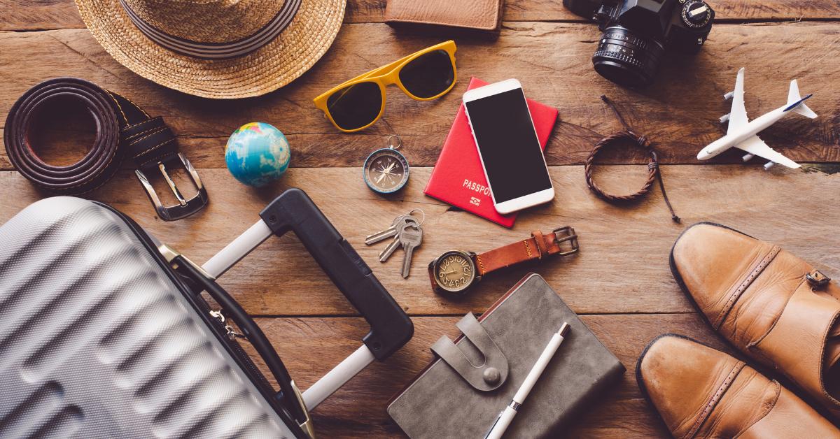 15 Must-Have Travel Essentials for Men You Shouldn’t Travel Without: phone, luggage, notebook, hat, sunglasses, key, phone